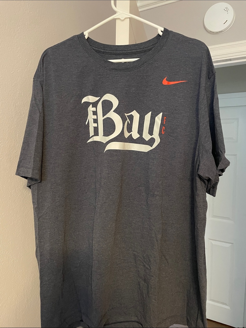 Nike Bay FC Men’s/Unisex Charcoal Gray 'The Bay' Short-Sleeve Tee w/Red Swoosh